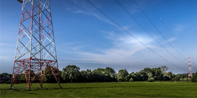 high-voltage line in green field